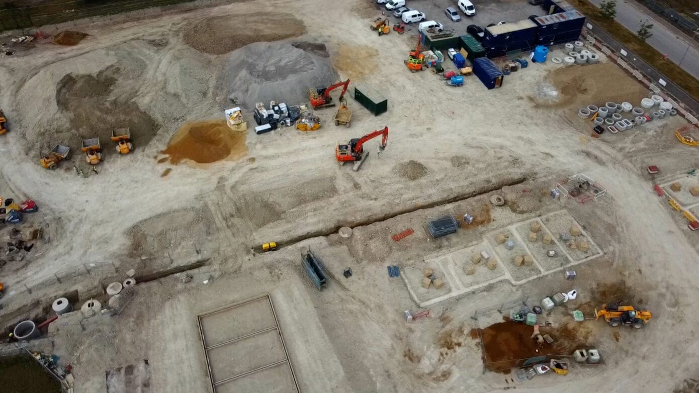 Aerial view of construction site with machinery.