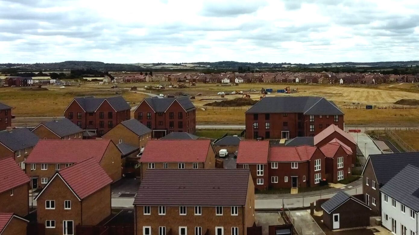 Newly developed housing estate in countryside view.